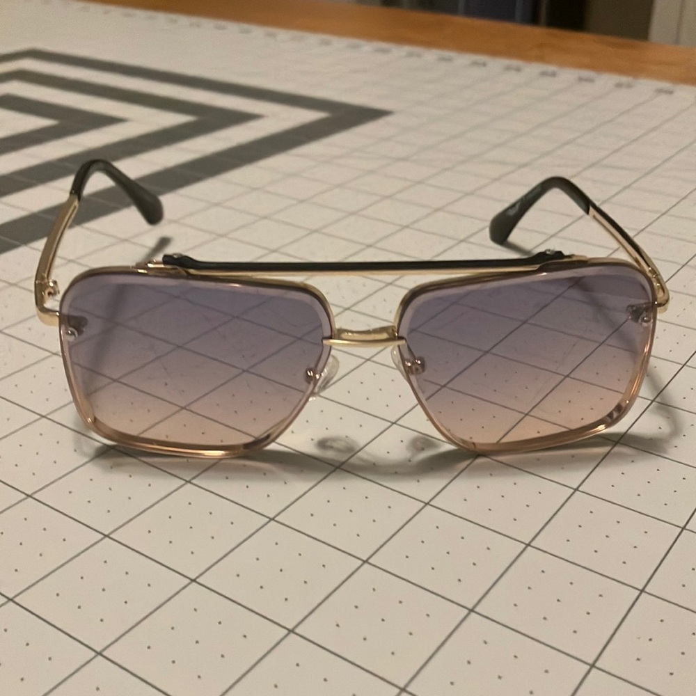 Tinted gold rim glasses